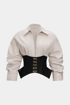 Beige shirt with a black corset belt featuring gold buckles on a white background