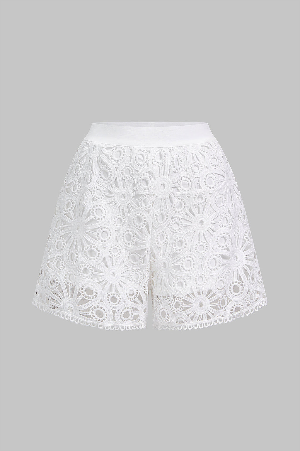 White semi-sheer lace shorts with cut-out detailing
