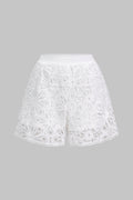 White semi-sheer lace shorts with cut-out detailing