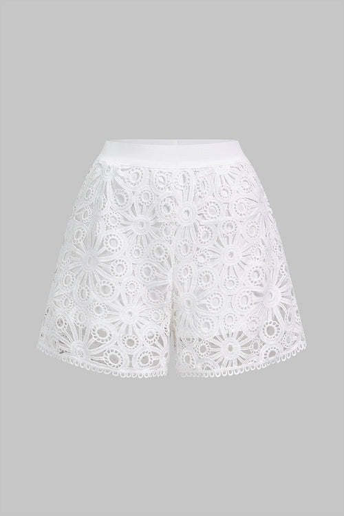 White semi-sheer lace shorts with cut-out detailing